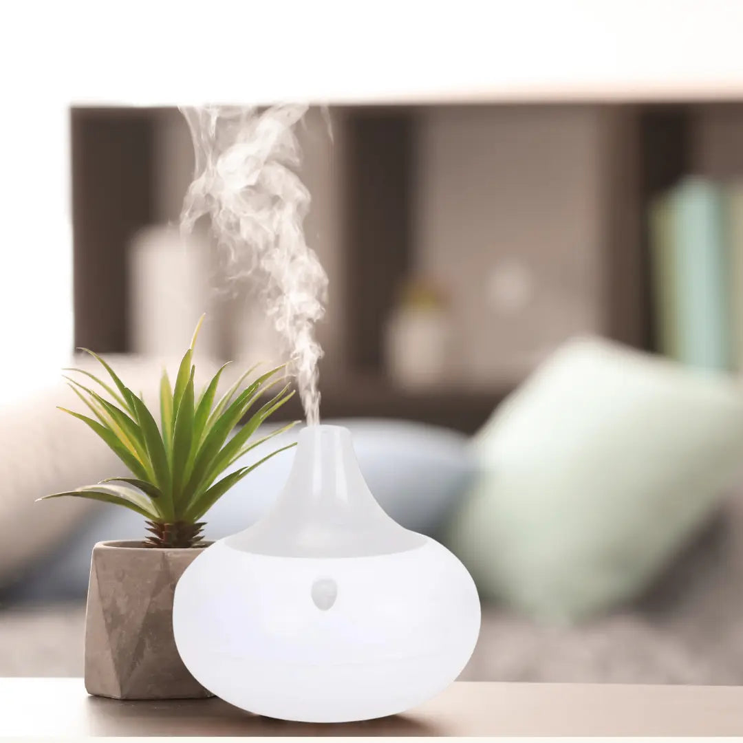 Humidificador Difusor de Aromas WT‑203 con LED Multicolor y 3 Aceites Esenciales – 80 ml Dropea
