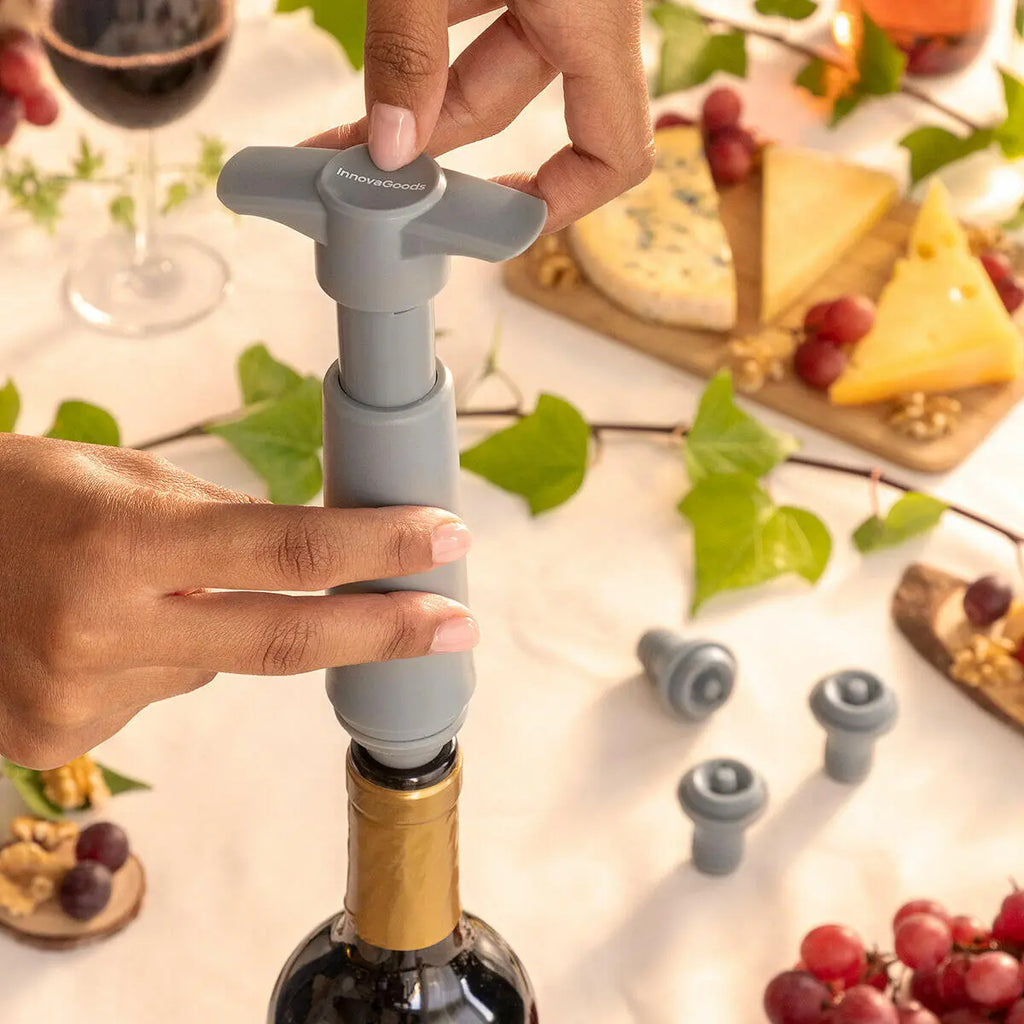 Bomba de Vacío y Tapones para Vino Winuum - InnovaGoods (4 tapones) Dropea