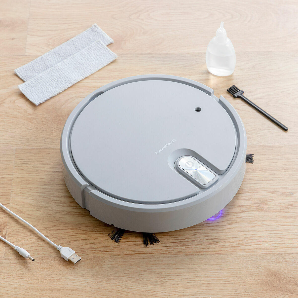 Robot Aspirador Recargable Multifunción 5 en 1 Varob con accesorios sobre el suelo