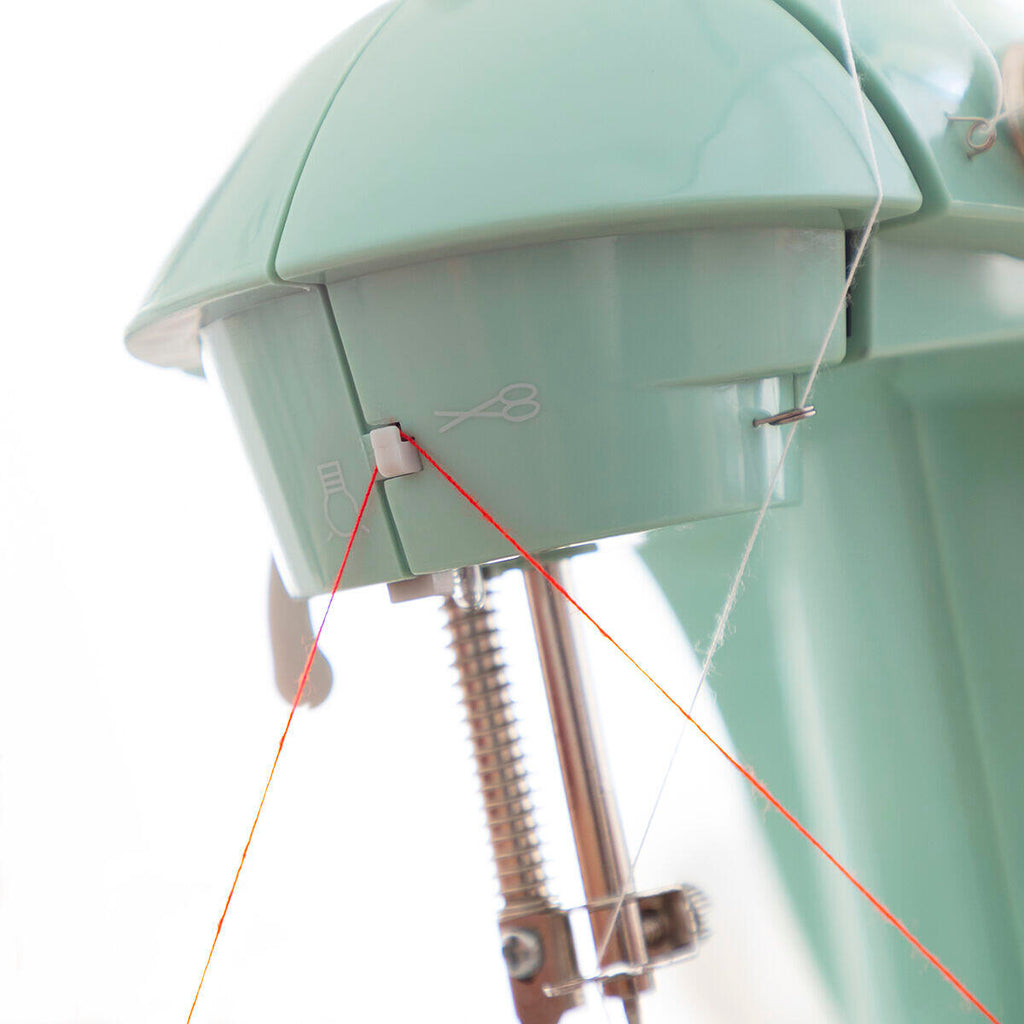 soporte de hilo de Mini máquina de coser portátil 