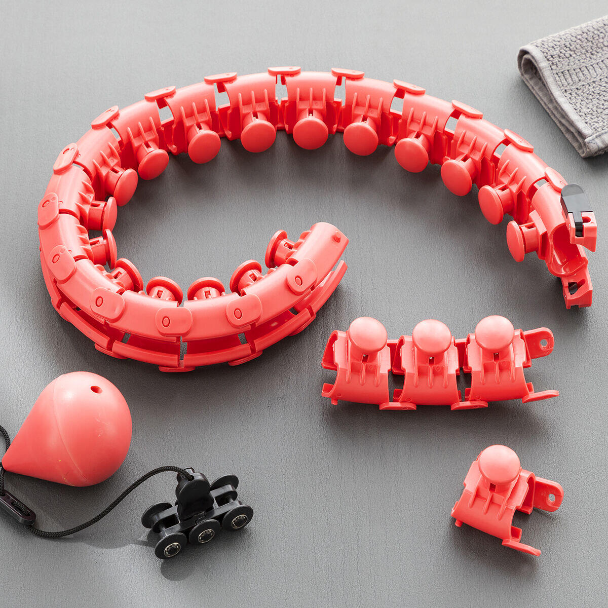 Aro de fitness inteligente ajustable con peso sobre el suelo