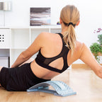 Mujer de espaldas usando el soporte lumbar corrector Lumport 
